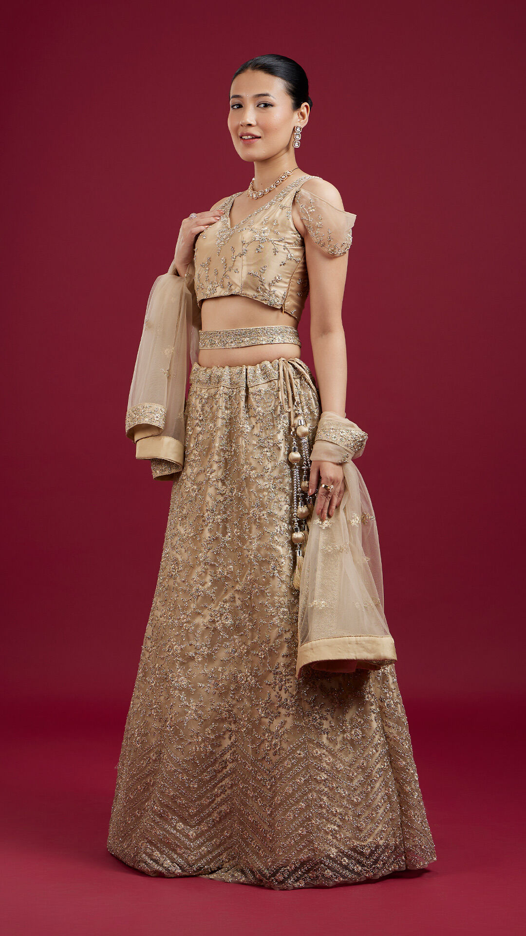 Bride flaunting her beautiful sequin lehenga and traditional bridal jewelry
